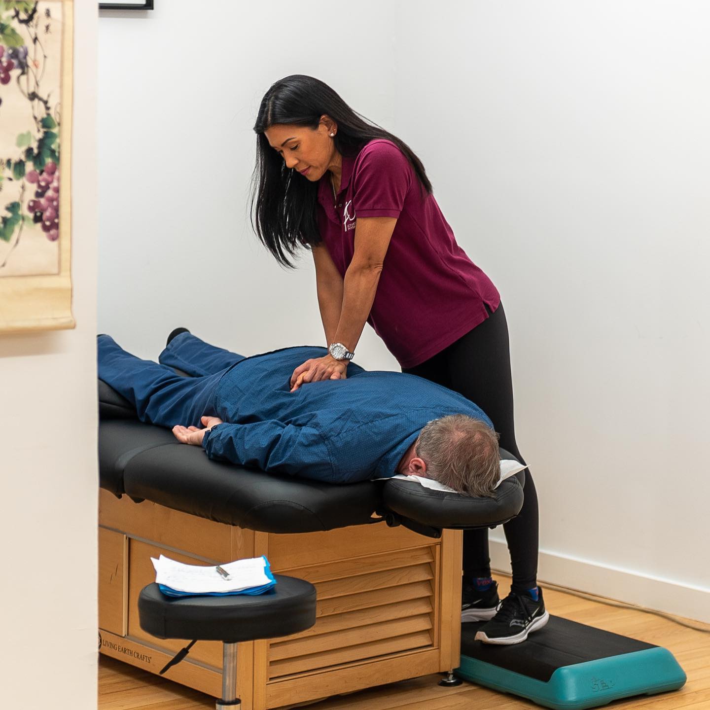 Physical therapist providing hands-on manual therapy for back pain relief and spinal rehabilitation at ActiveCare Physical Therapy in Midtown Manhattan, New York City.
