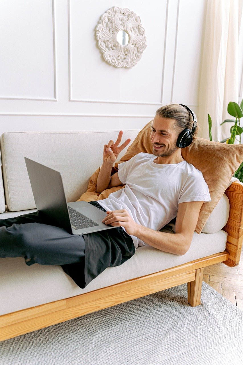 Patient participating in a virtual telehealth physical therapy consultation from home with ActiveCare Physical Therapy NYC, receiving personalized rehabilitation, injury recovery guidance, pain management, and movement assessment.